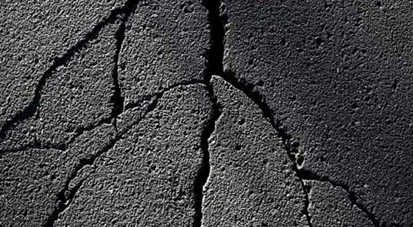 cracks in a driveway photo shown